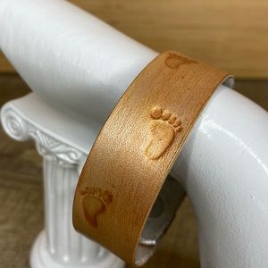 Tan painted leather bracelet .75” wide footprints handmade jewelry